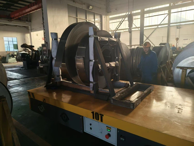 Our factory mainly handles large molds and heavy structural components, often weighing tens of tons. In the past, we relied on rail-mounted transfer carts, which caused endless headaches. Tracks had to be laid in advance, disrupting the workshop floor and locking us into fixed transport routes. Once the layout needed adjustment, the tracks became a limitation instead of a solution. On top of that, dust and debris easily accumulated on the rails, requiring frequent cleaning and maintenance. Our factory mainly handles large molds and heavy structural components, often weighing tens of tons. In the past, we relied on rail-mounted transfer carts, which caused endless headaches. Tracks had to be laid in advance, disrupting the workshop floor and locking us into fixed transport routes. Once the layout needed adjustment, the tracks became a limitation instead of a solution. On top of that, dust and debris easily accumulated on the rails, requiring frequent cleaning and maintenance.